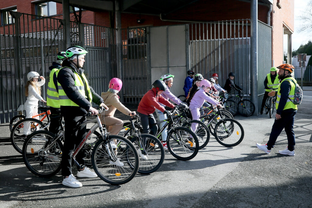 Photo of school children on bikes
